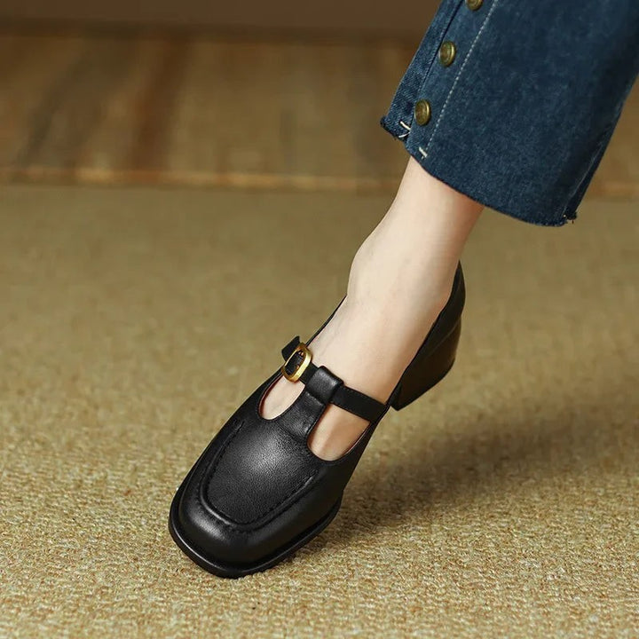 Black leather T-strap Mary Jane shoe styled with denim jeans