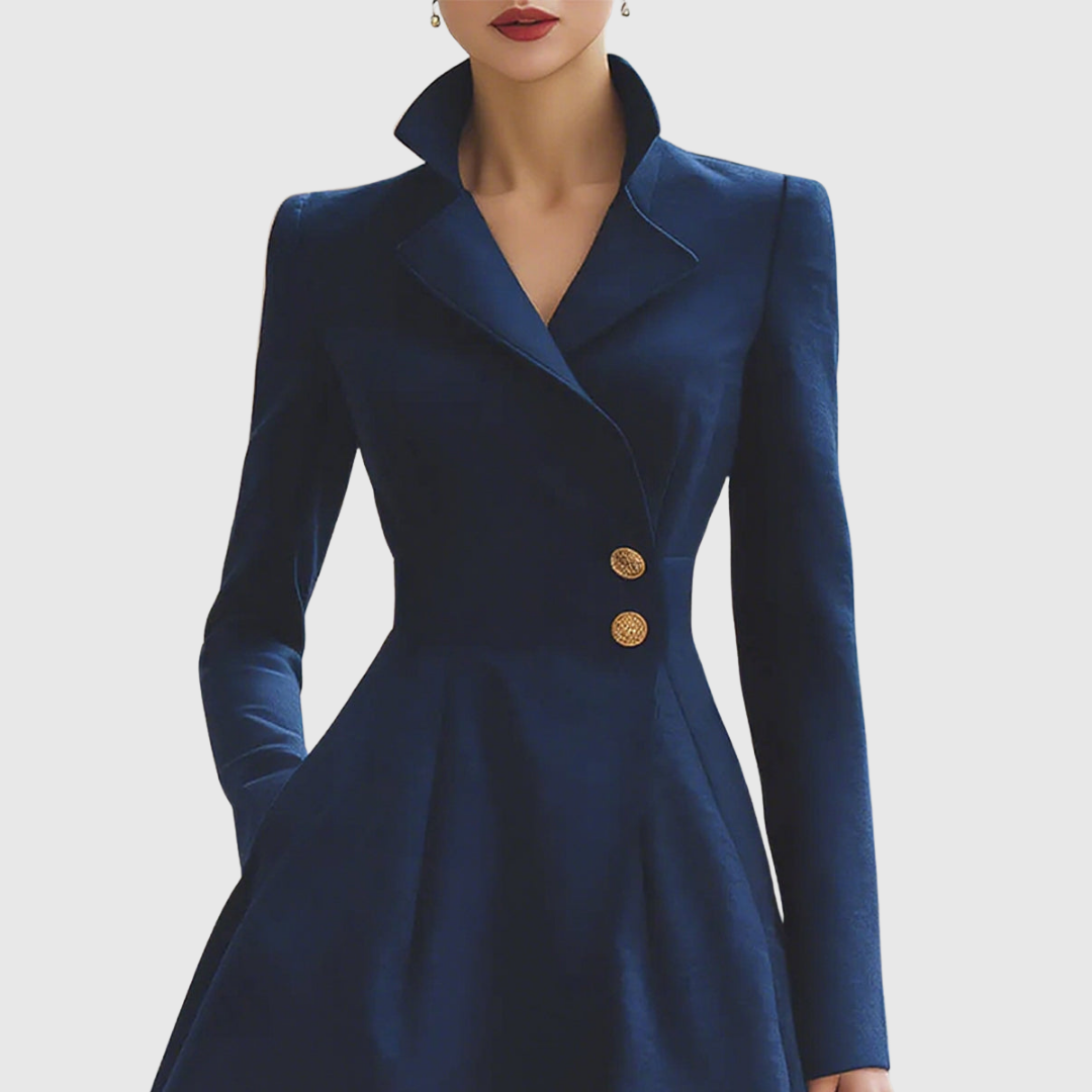 close-up of navy coat dress lapel collar and gold button closure