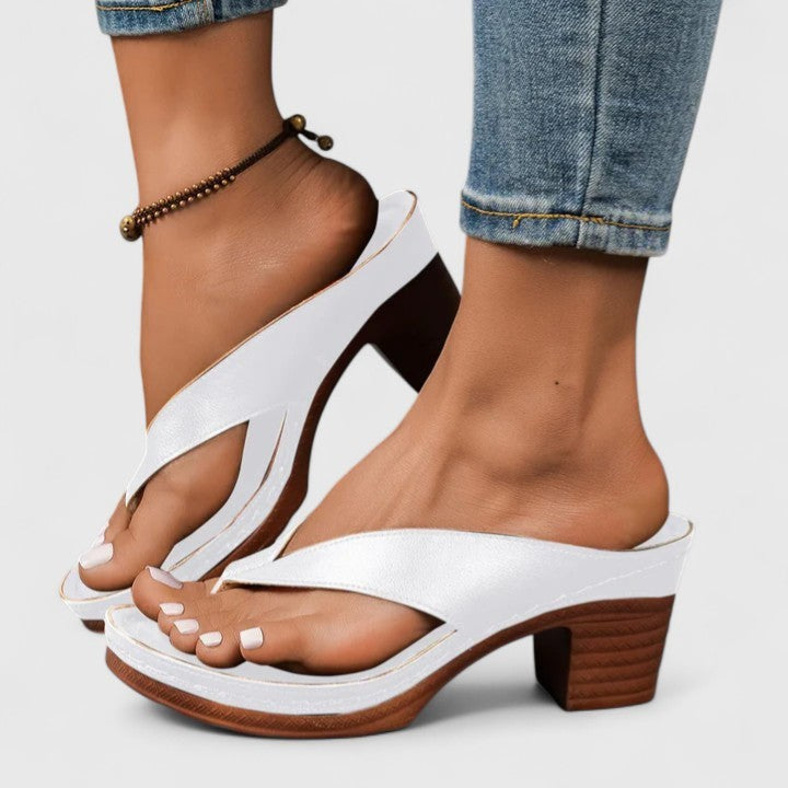 White leather flip-flop heels with square platform toe and chunky heel