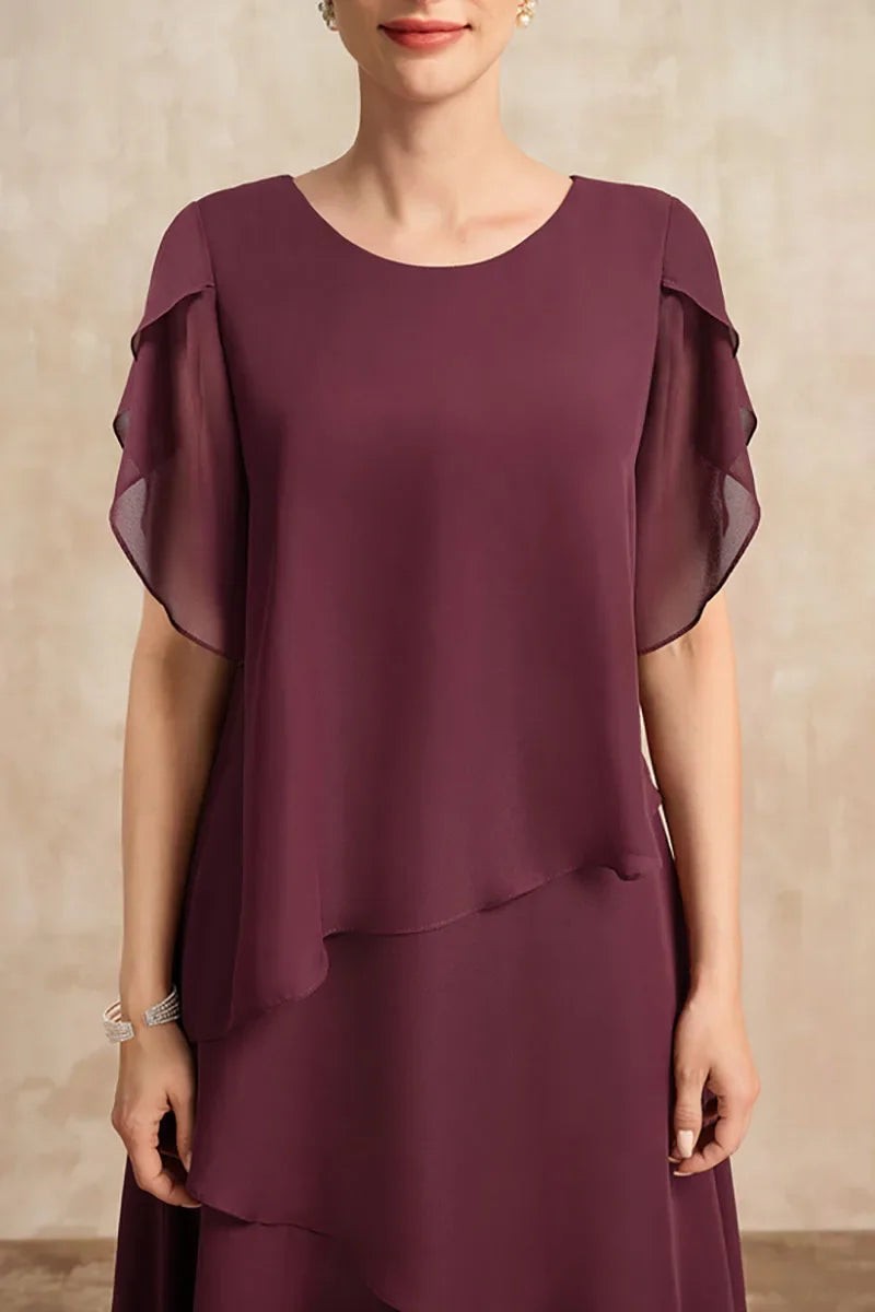 close-up of burgundy chiffon dress bodice with flutter sleeve detail