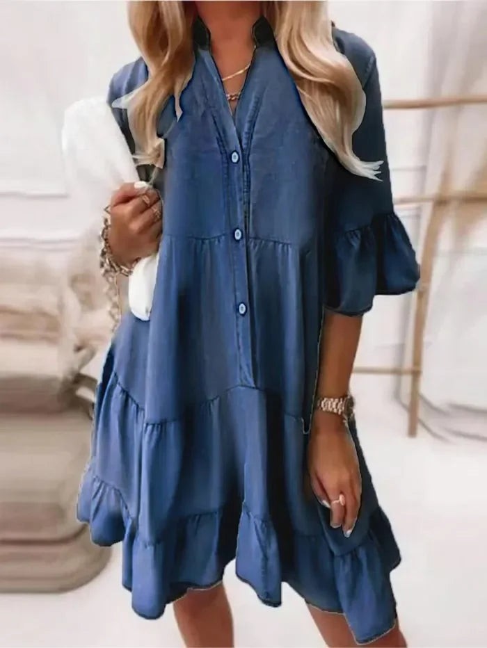 Steel blue tiered mini dress with button-front detail and ruffled bell sleeves