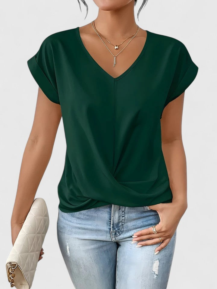 dark green V-neck blouse featuring draped twist-front design