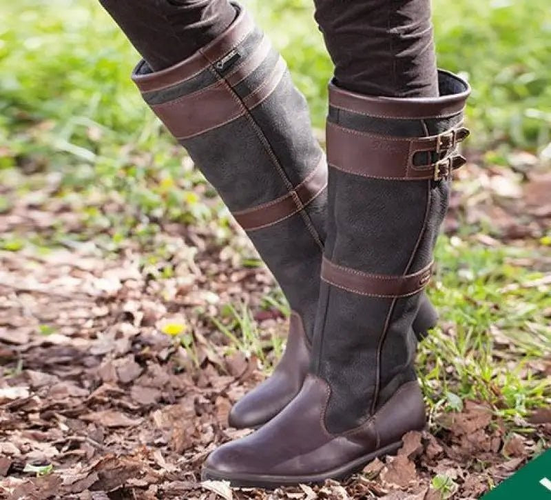Knee-high leather waterproof boots in black and brown with buckle straps