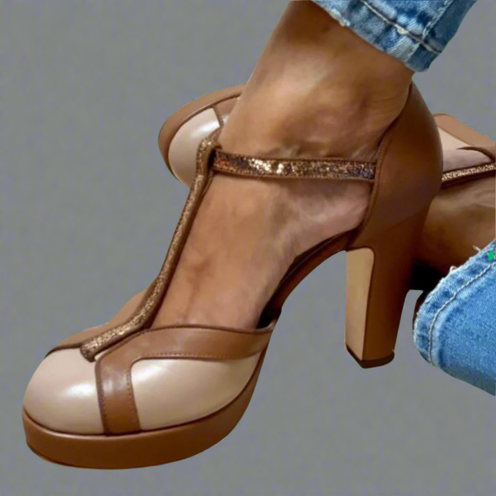 Close-up of chunky heel sandal showing glitter T-strap and round toe platform design