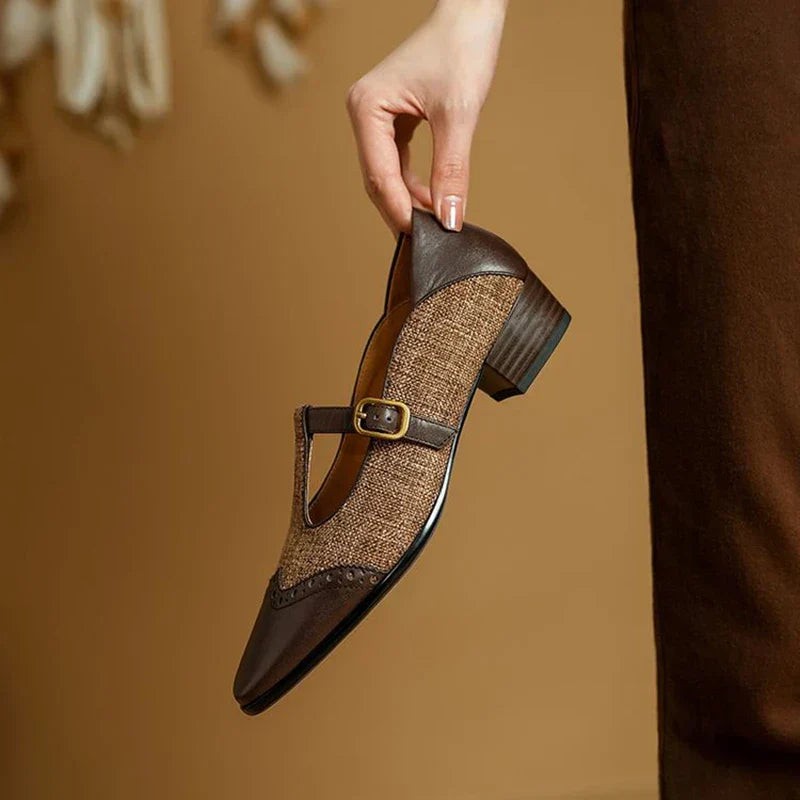 Close-up of brown tweed Mary Jane shoe heel with wingtip brogue detailing