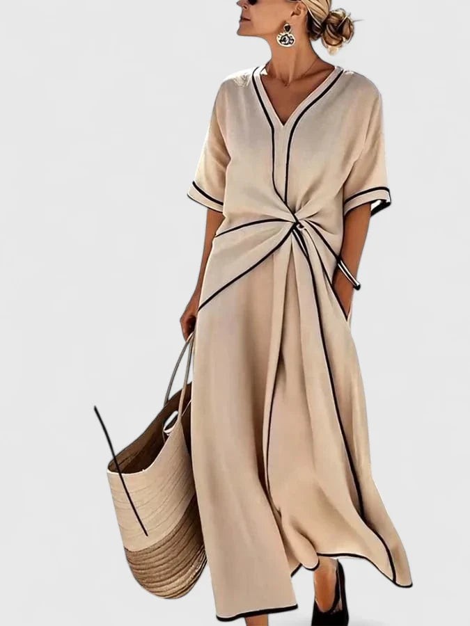 Beige V-neck maxi dress with contrast piping and twist-front waist detail