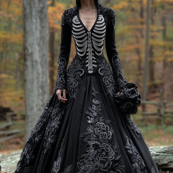 Close-up of skeleton print bodice on black A-line gown with rose lace embellishments outdoors