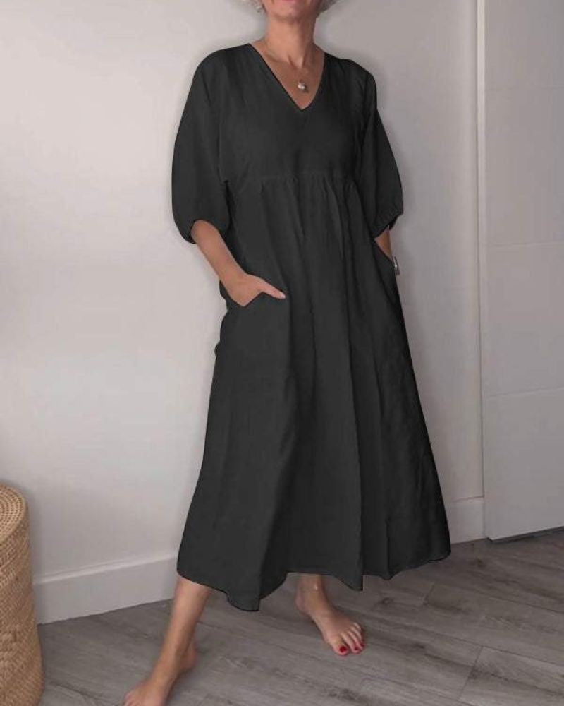 Black linen maxi dress with V-neck and half sleeves, relaxed silhouette