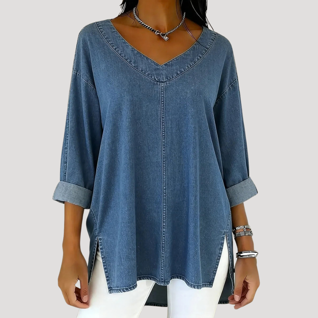 Blue oversized V-neck tunic top with rolled sleeves and side slits