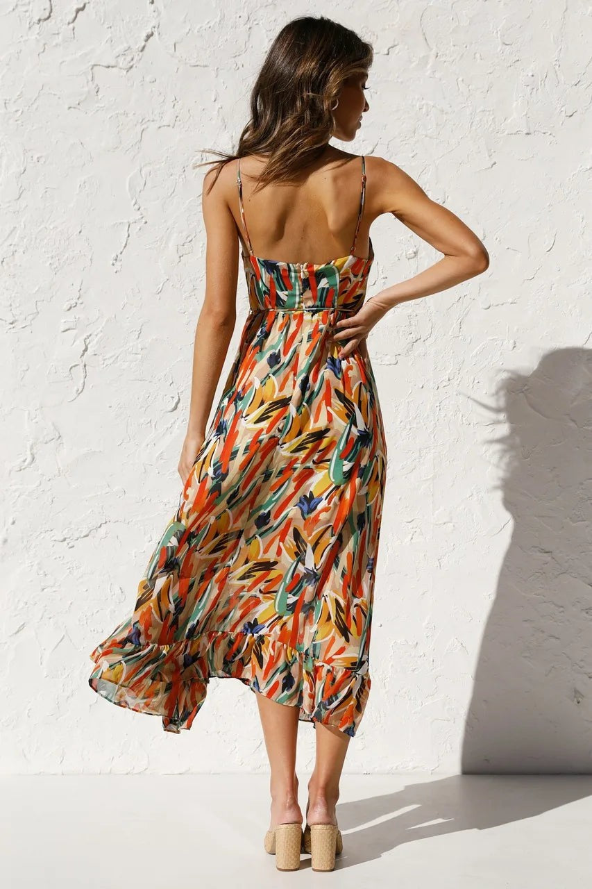 Back view of colorful printed midi dress with adjustable spaghetti straps