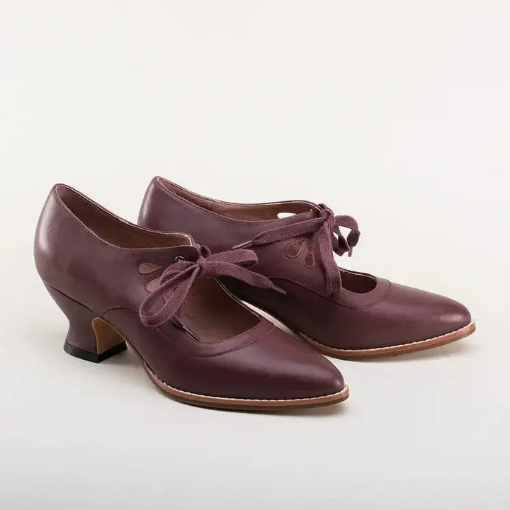 burgundy leather pin-up heels with teardrop cutouts and tie laces