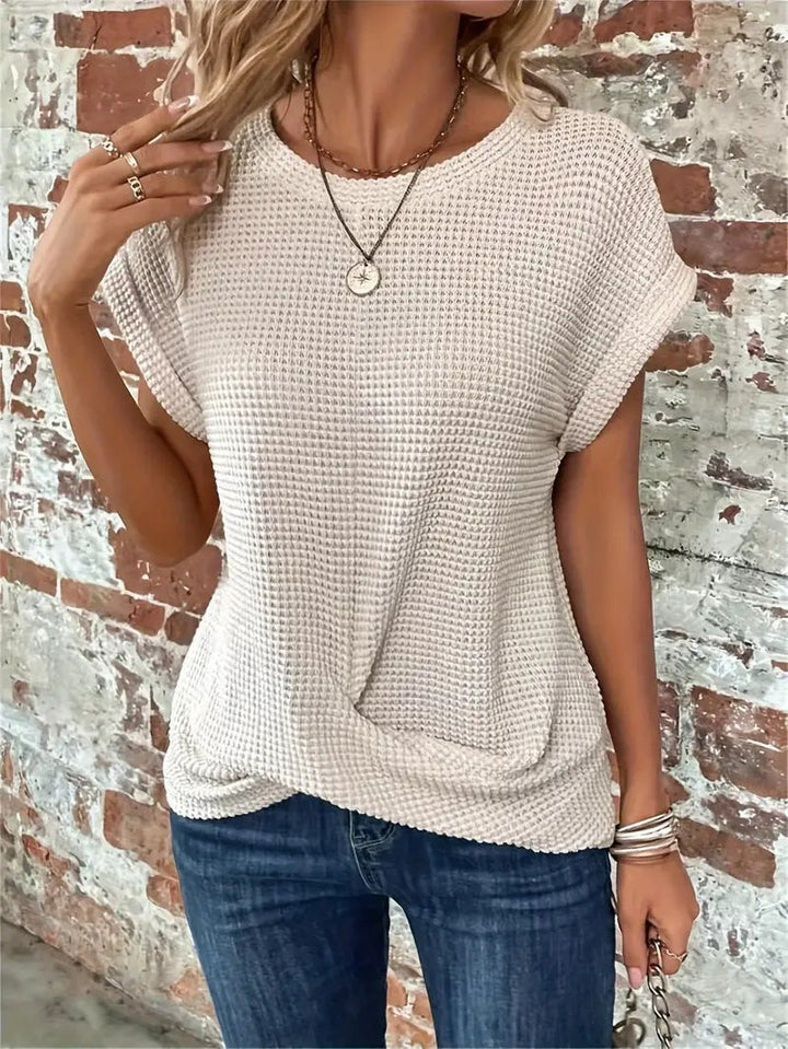 Beige waffle knit casual tee with draped twist-front detail