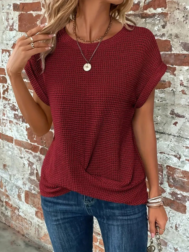 Burgundy waffle knit tee showing twist-front design and round neckline