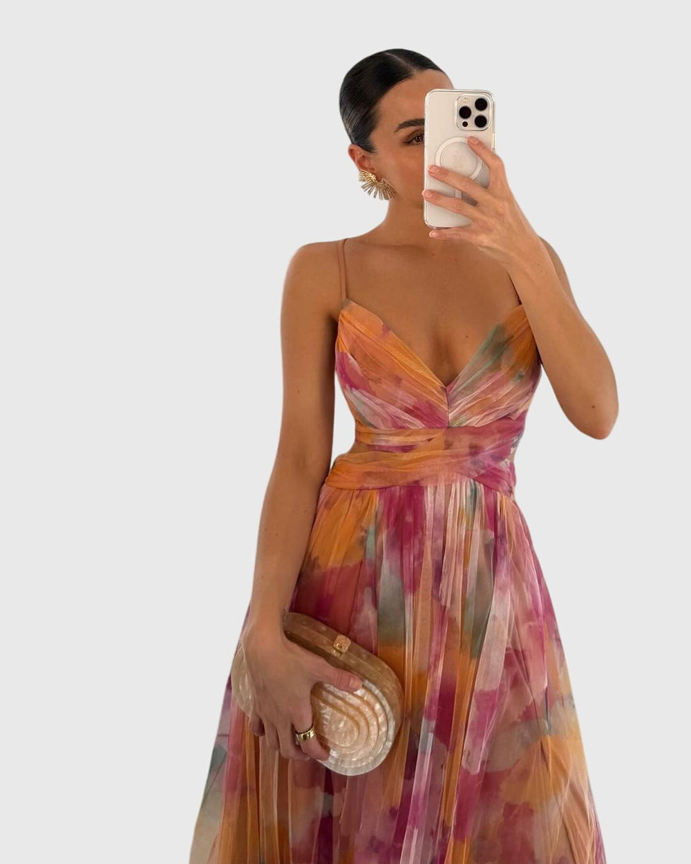 Close-up of watercolor print maxi dress with crisscross cutout bodice