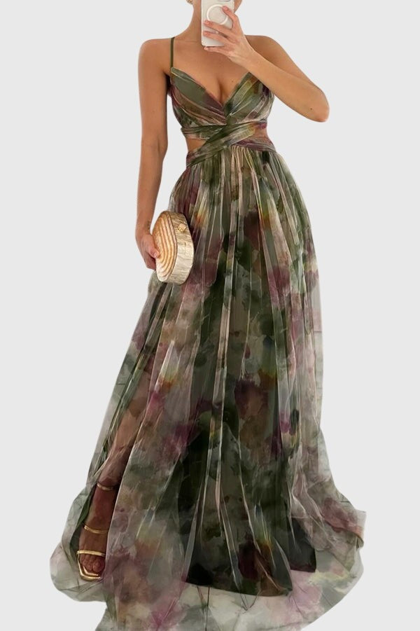 Green watercolor print maxi dress with cutout sides and pleated skirt