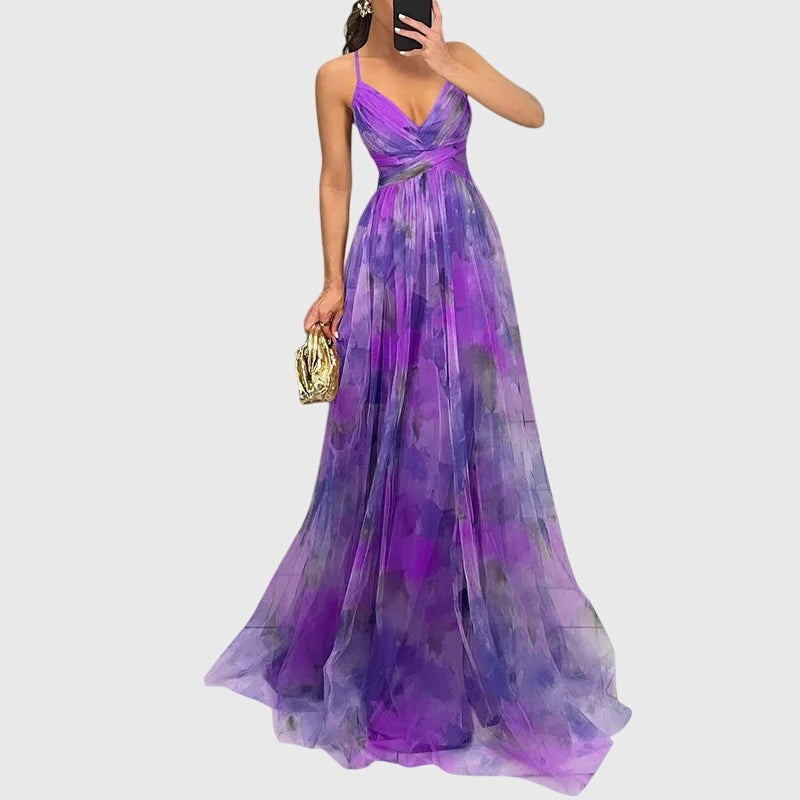 Purple watercolor print maxi dress with spaghetti straps and flowing skirt