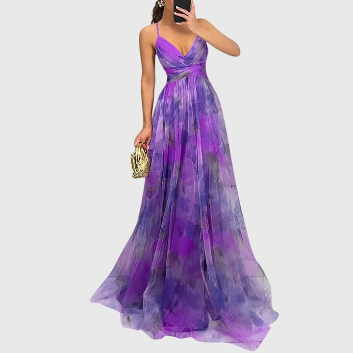 Purple watercolor print maxi dress with spaghetti straps and flowing skirt