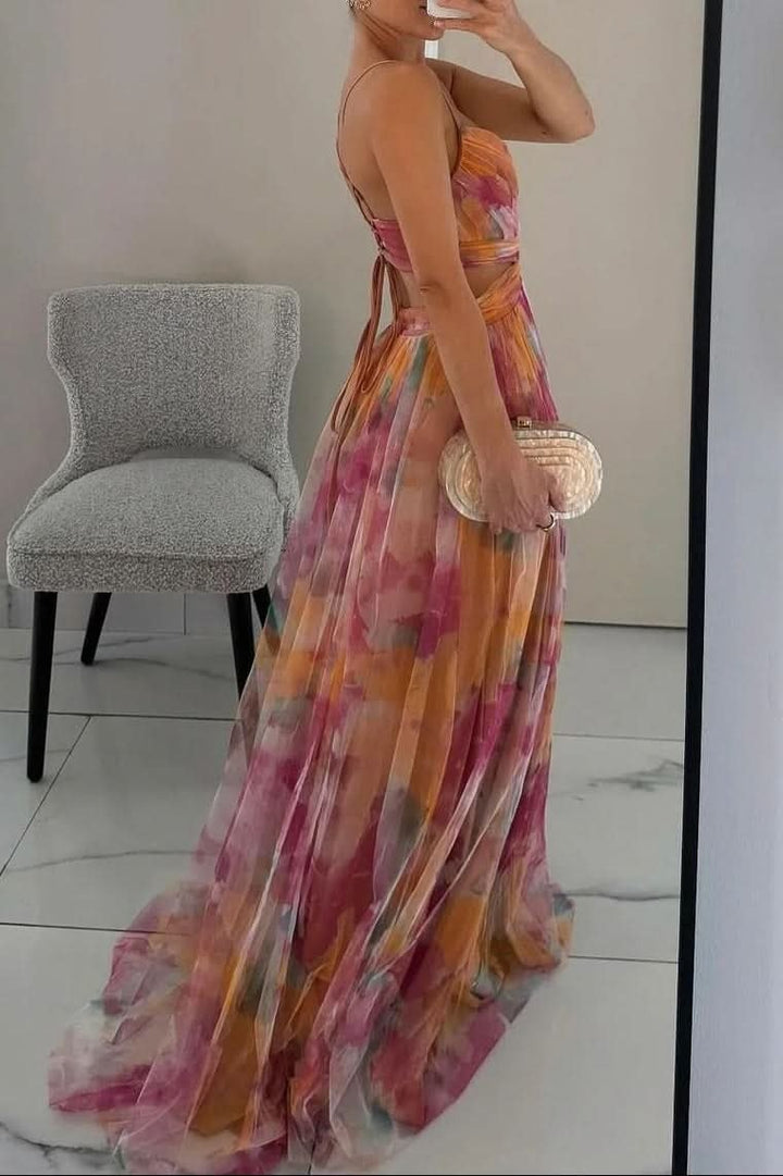 Side view of floral tulle maxi dress showing crisscross back straps