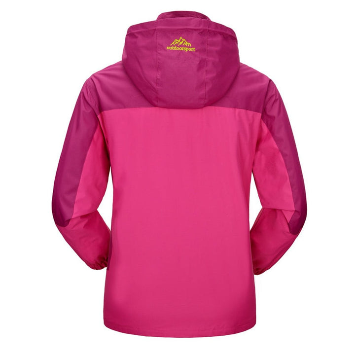 Back view of pink and magenta hooded waterproof outdoor shell jacket