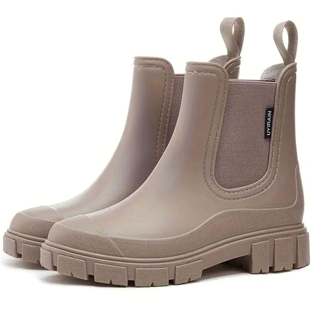 Taupe Chelsea rain boots with elastic side panel and chunky lug sole