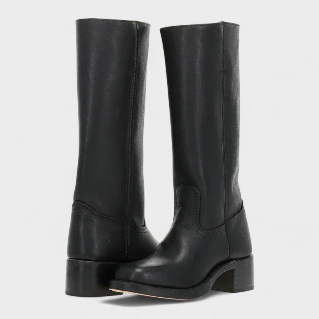 Black leather knee-high western boots featuring a sturdy block heel