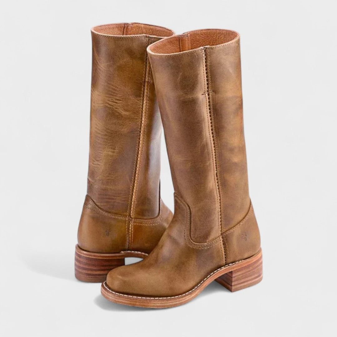 Tan leather knee-high boots with stacked block heel and stitched detailing