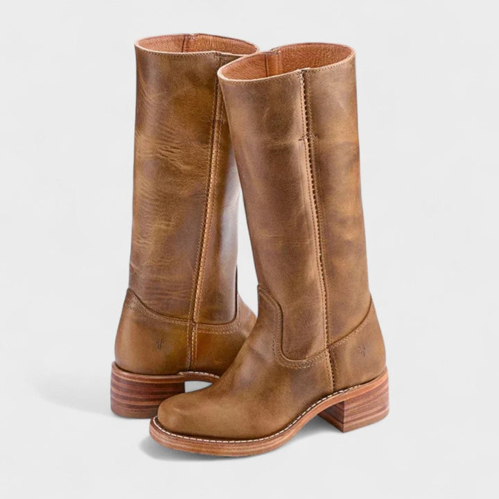 Tan leather knee-high boots with stacked block heel and stitched detailing
