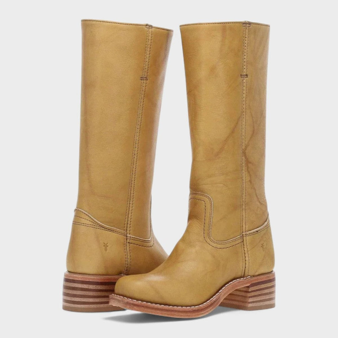 Mustard yellow leather knee-high boots with contrast stitching and block heel