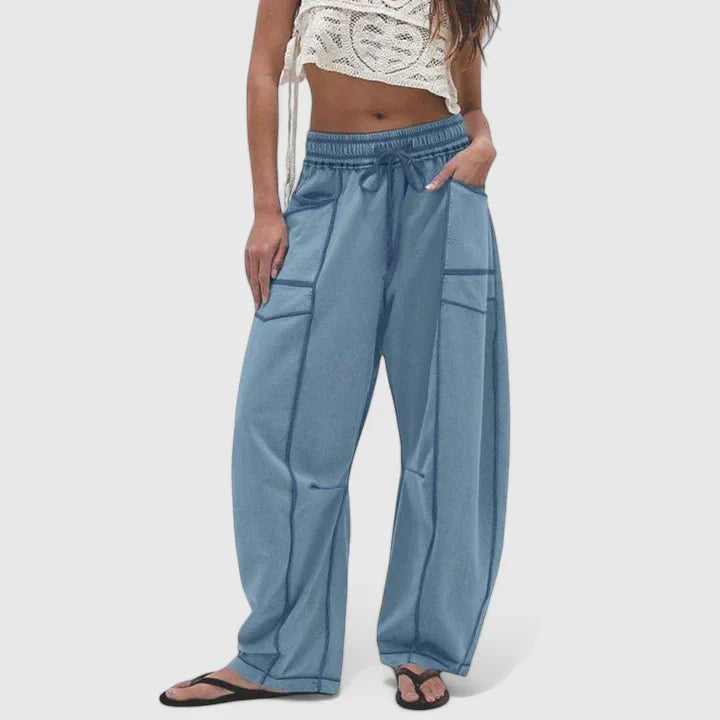 dusty blue wide-leg cargo pants with drawstring waist and topstitching