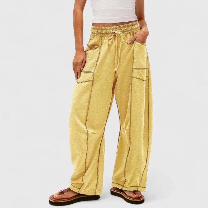 mustard yellow wide-leg cargo pants with drawstring waist and pockets