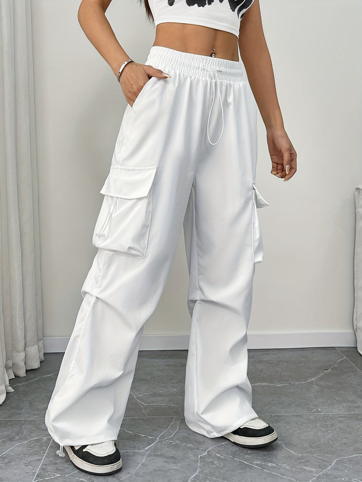 White wide-leg cargo pants with drawstring waist and side pockets