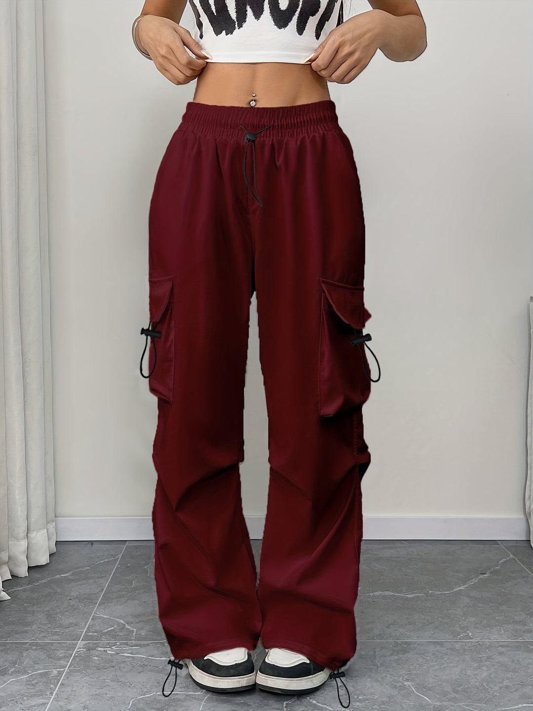 Burgundy wide-leg cargo pants with drawstring hem and side pockets