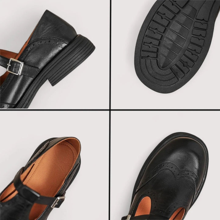 Close-up details of black Mary Jane shoe showing sole tread and buckle strap