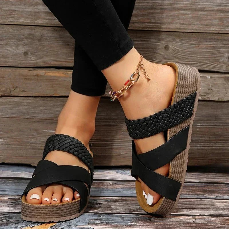 black woven crisscross platform sandals with thick cushioned outsole