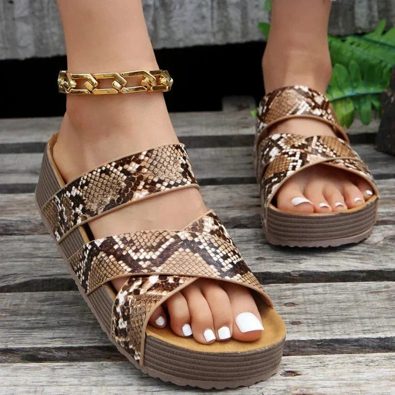 Snakeskin print double-strap platform sandals with cushioned footbed and wedge sole