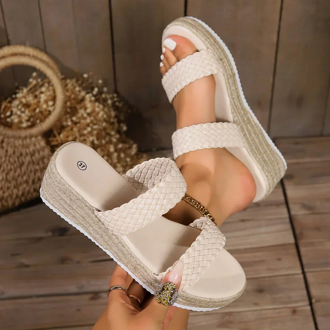 Overhead view of cream woven platform wedge sandals with espadrille sole