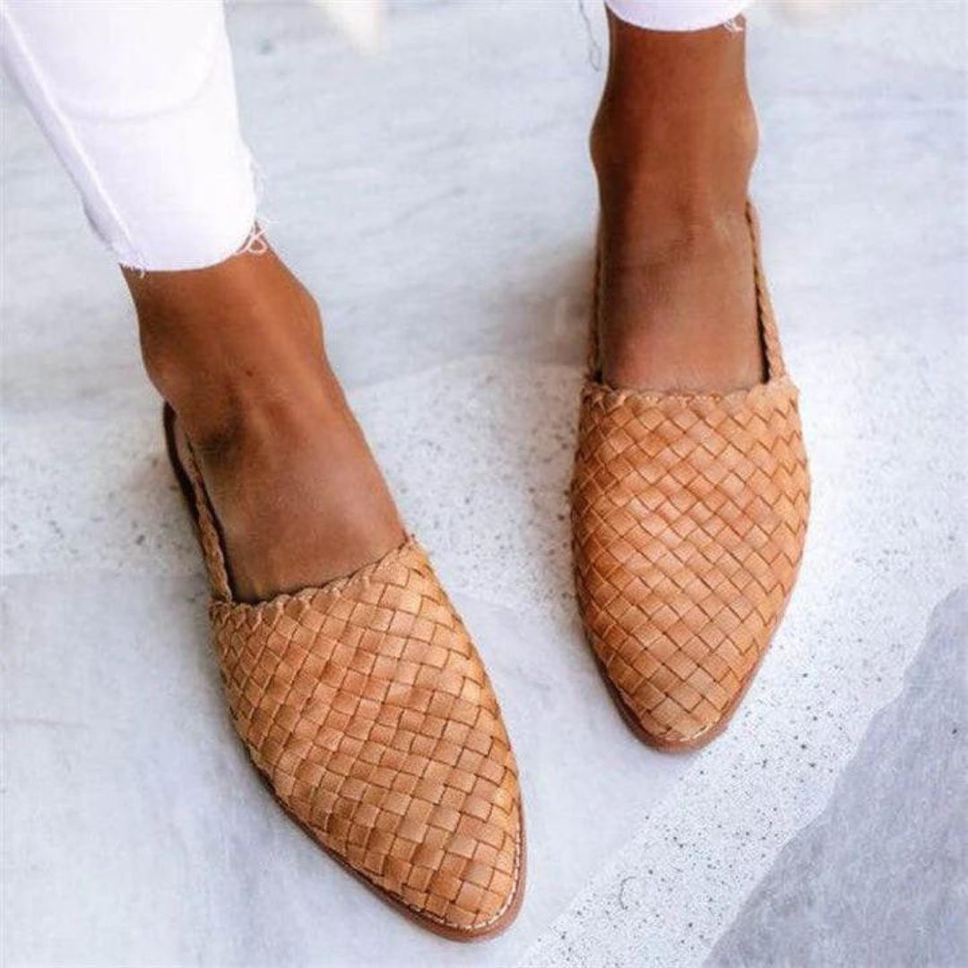 Tan woven vegan leather ballerina flats featuring pointed toe and slingback style