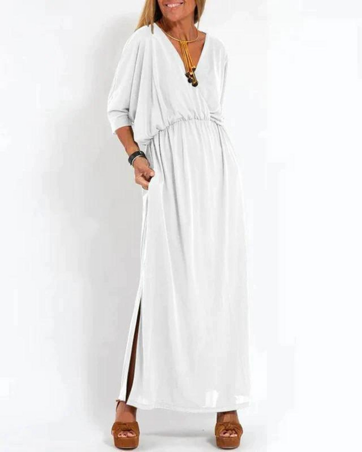 White V-neck maxi dress featuring dolman sleeves and elastic waist