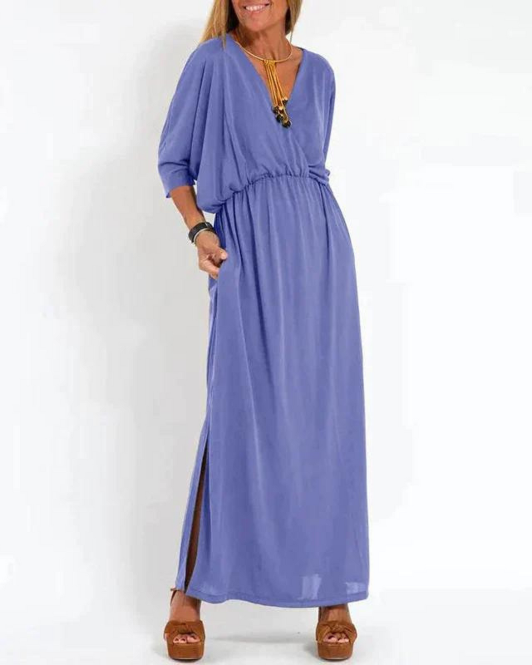 Periwinkle blue V-neck maxi dress with fitted waist and flowy skirt