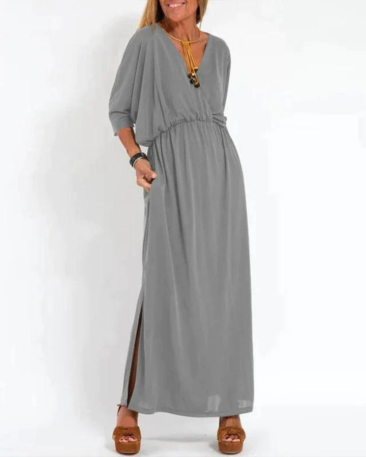 Gray V-neck maxi dress with cinched waist and ankle-length hem