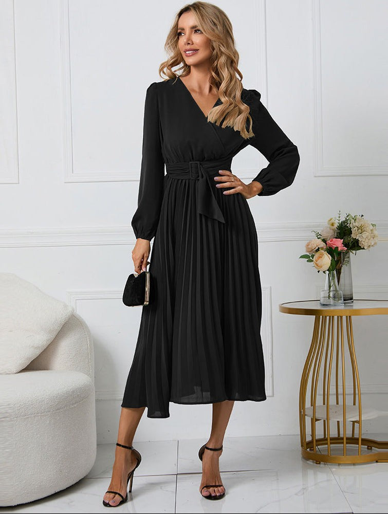 Black pleated midi dress featuring wrap V-neck and long balloon sleeves