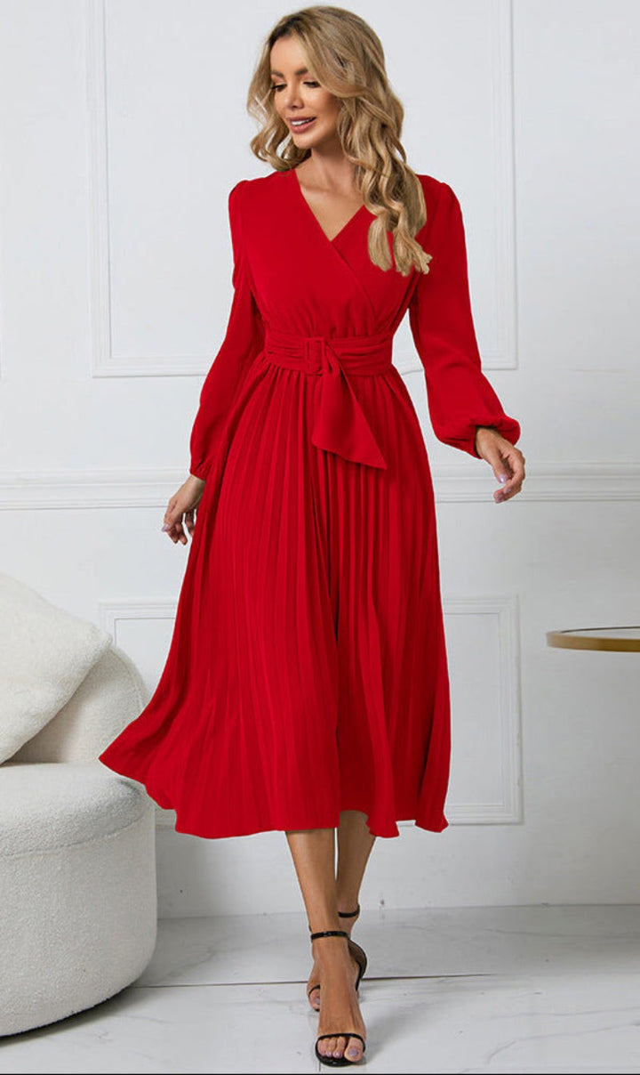 Red pleated midi dress with tie belt, V-neck, and long sleeves