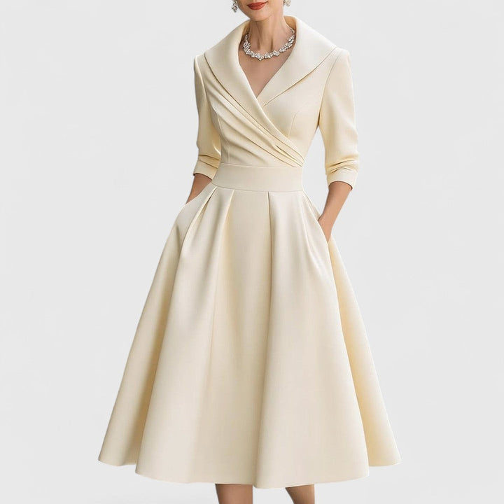 Ivory satin midi dress with collared neckline and pleated skirt