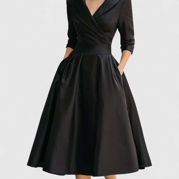 Front view of black satin midi dress with pockets and A-line skirt