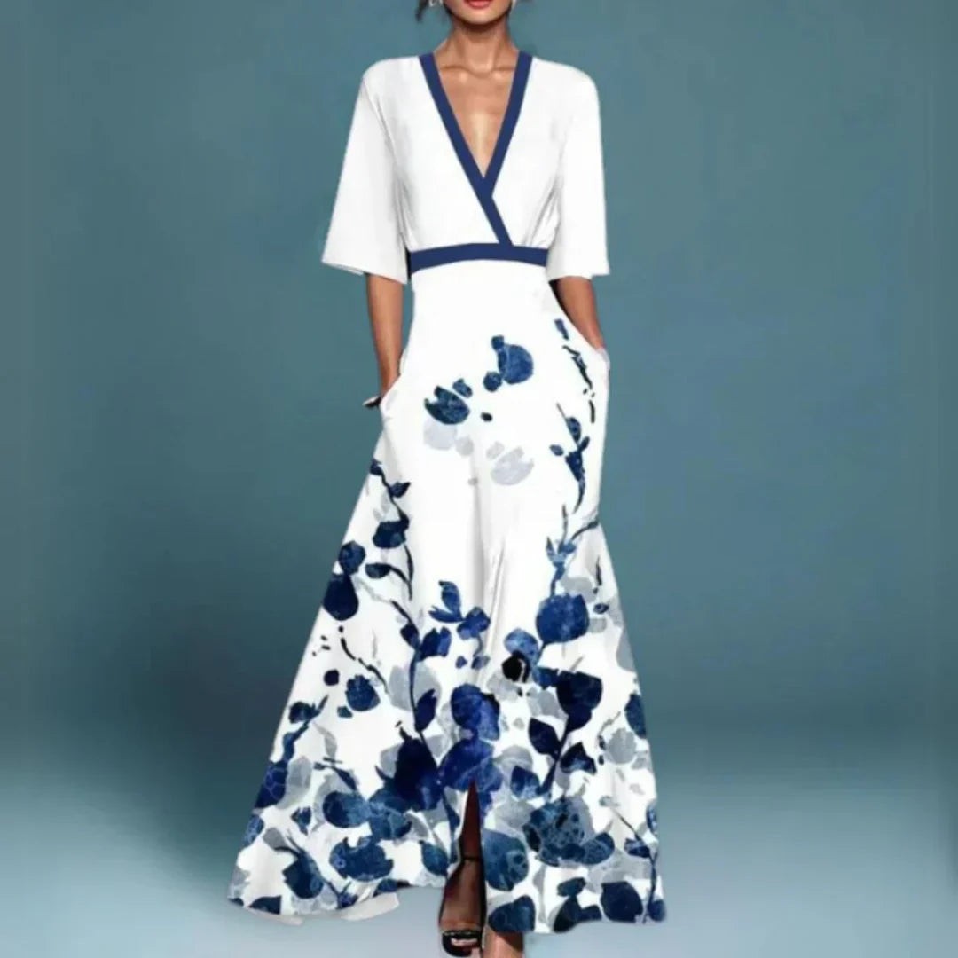 White maxi dress with blue floral print and contrast trim
