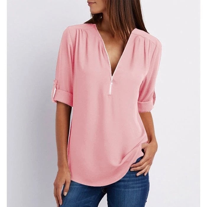 Pink zip-up V-neck blouse with rolled half sleeves and curved hem